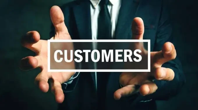 Hands framing the word customers